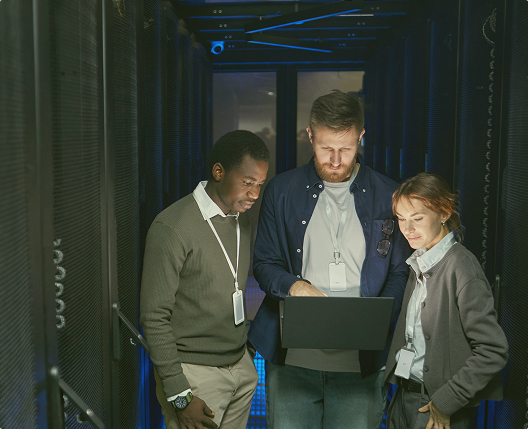 Team reviewing technology systems